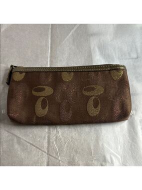 Brown and Gold Signatures Patterned Clutch